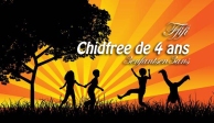 Royalty-free people stock photo of four silhouetted children running, holding hands and doing somersaults in a field near a tree, against a bursting orange sunset.